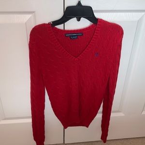 this is a Ralph Lauren sweater in a size S